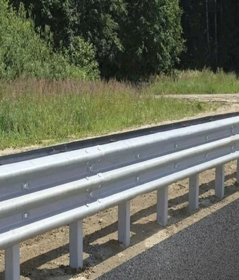 Double beam metal crash barrier